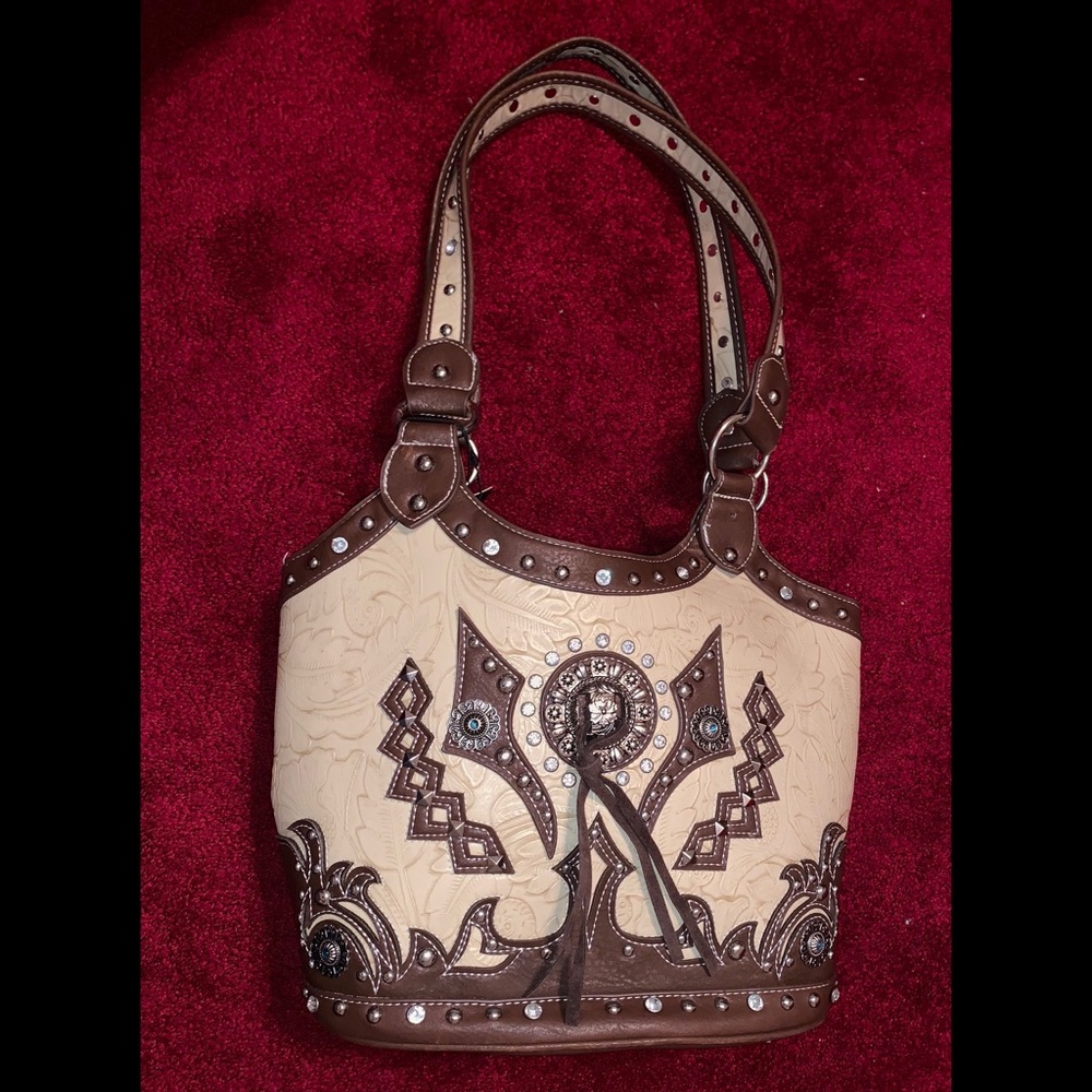 Cowgirl Trendy purse.🌼